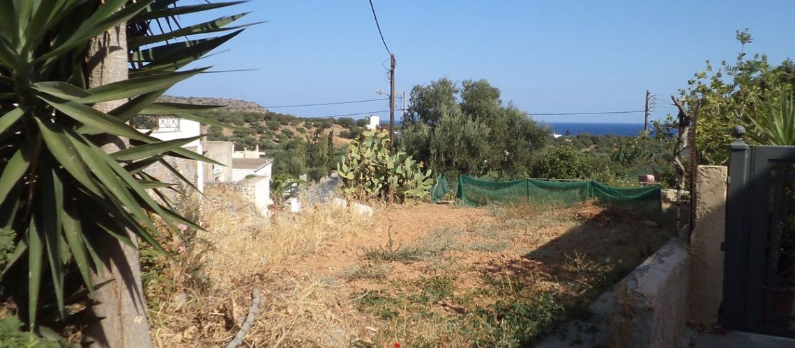 Πωλείται γωνιακό οικόπεδο με θέα θάλασσα στο παραδοσιακό χωριό Μίλατος Λασίθι Corner plot with sea view for sale in traditional Milatos village Lasithi εικόνα ακινήτου